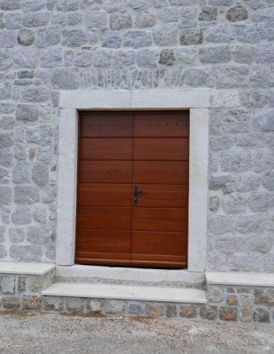 Front of main house with new door and windows